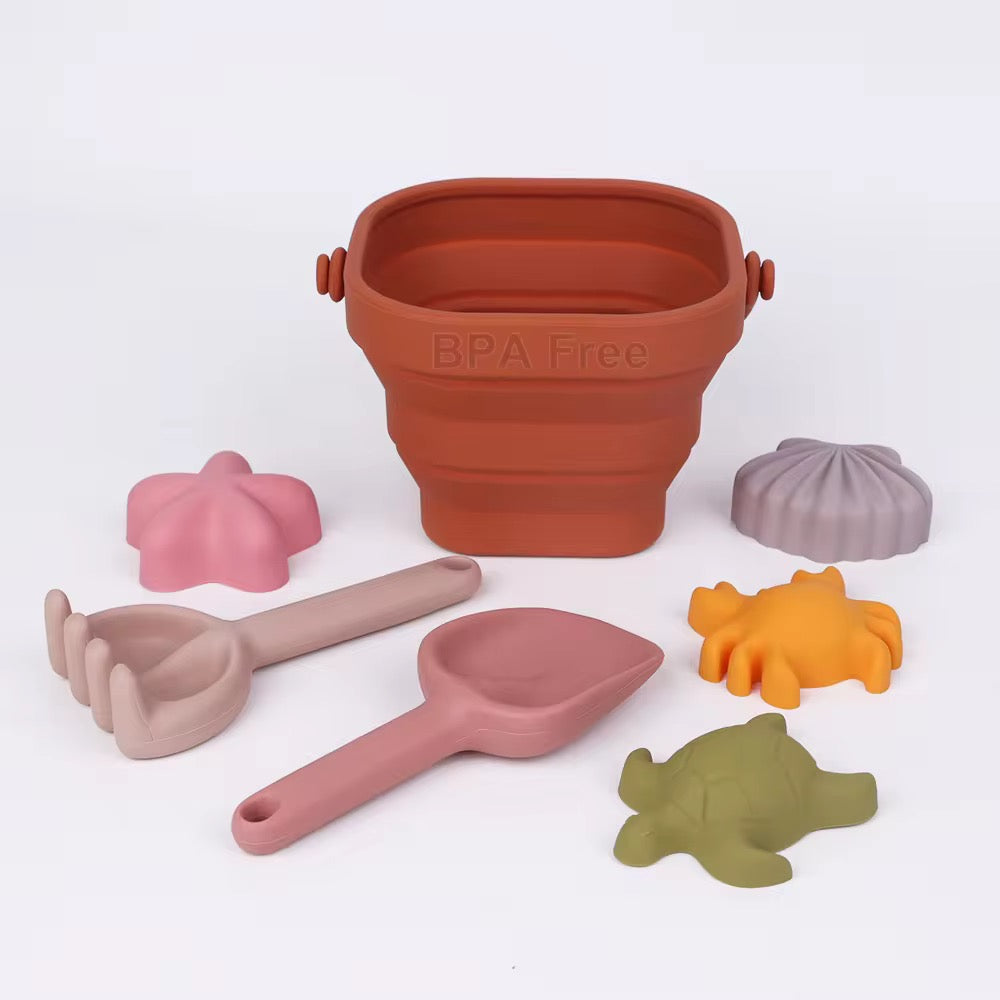 Eco-friendly beach play set with soft silicone bucket and assorted sand molds
