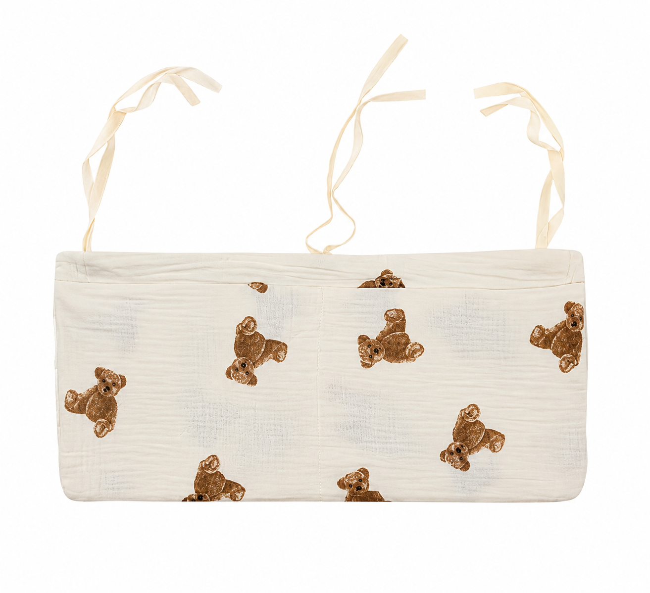Bedside diaper organiser caddy in cream muslin with teddy bear print and tie straps — included in Maxims baby store. Hello Little Cub newborn gift box UAE