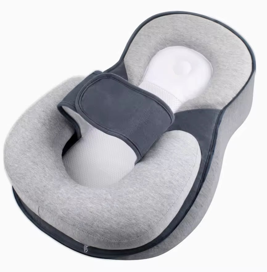 Baby feeding support pillow featuring a secure newborn lounger design, breathable materials, and anti-reflux positioning.
