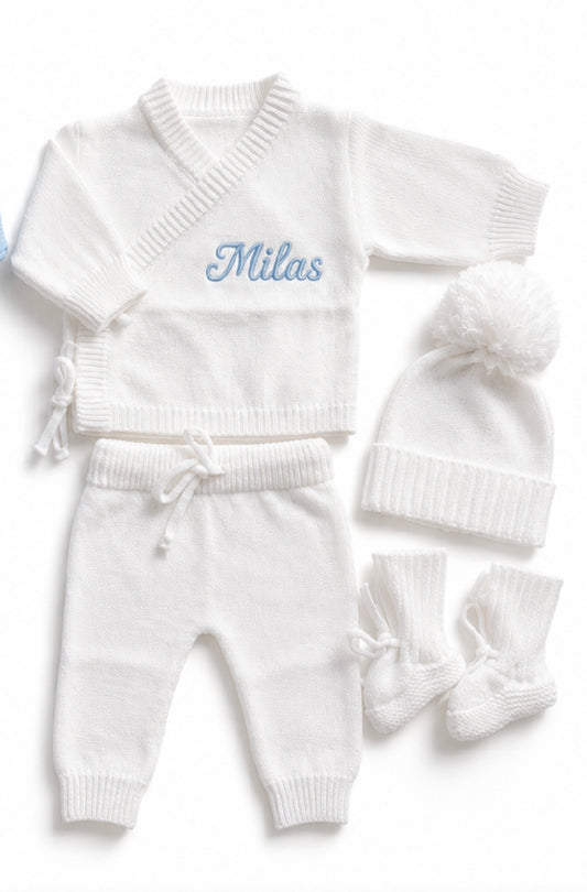 Detail view of personalised white bamboo cotton newborn knit outfit set with embroidered name — Maxims Baby store .UAE