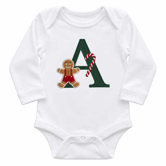 White personalised Christmas baby bodysuit with forest green embroidered B initial, gingerbread man and candy cane on white background