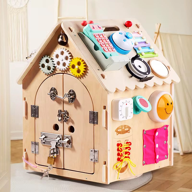 Interactive sensory busy board playhouse with locks, shoelaces, calculator, and smiley button for children