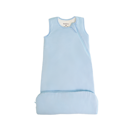     Light blue baby sleep sack with sleeveless design and front zip closure on white background.