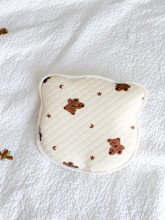 Quilted anti-flat-head baby pillow in cream with teddy bear, moon and stars print — gentle head shape support, included in Maxims baby store. Hello Little Cub gift box
