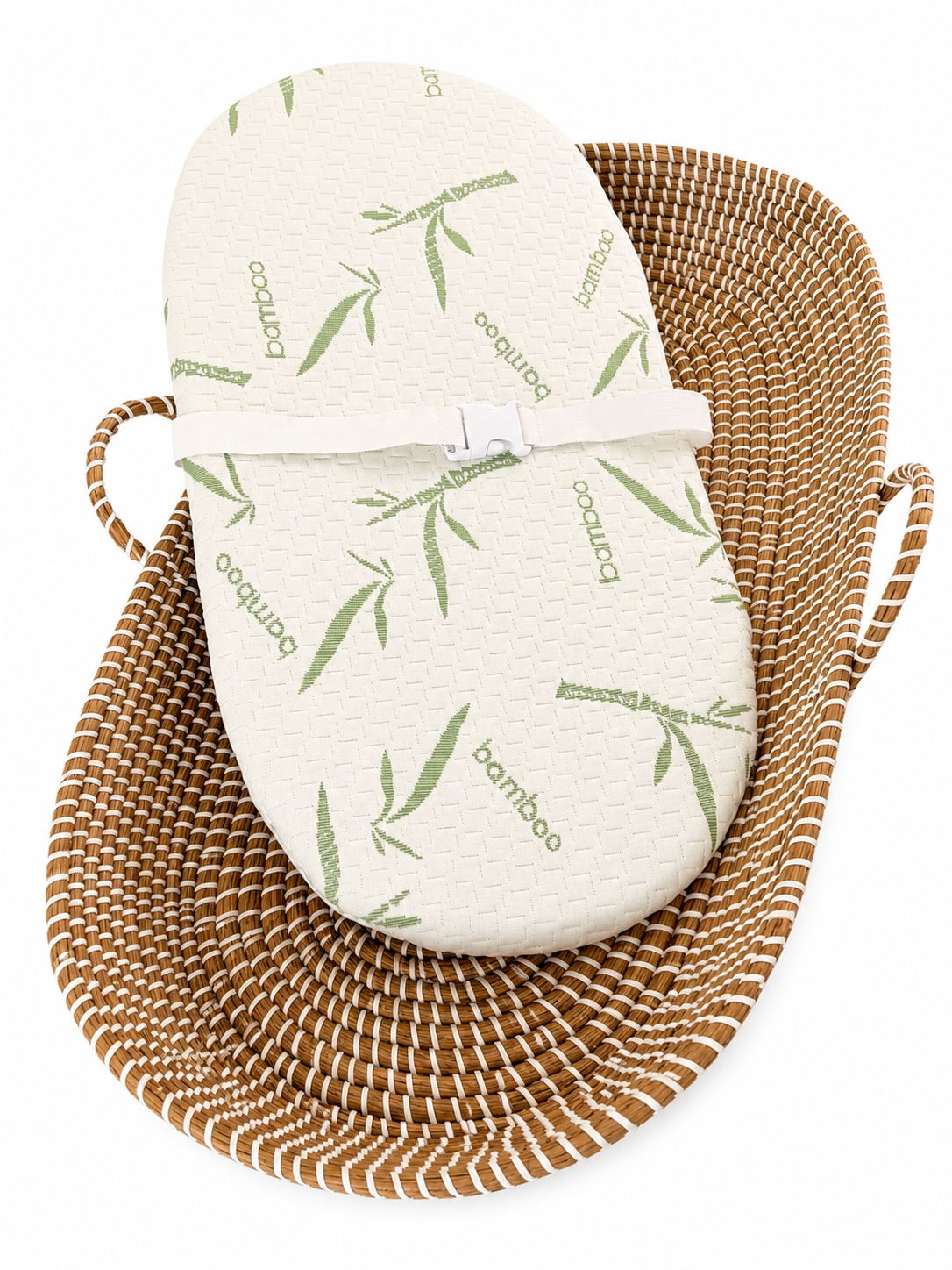 Bamboo baby mattress detail inside handwoven wicker basket