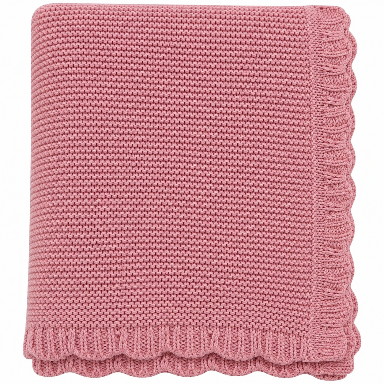 Blush pink scalloped knitted baby blanket with decorative knitted edge folded on a white background.