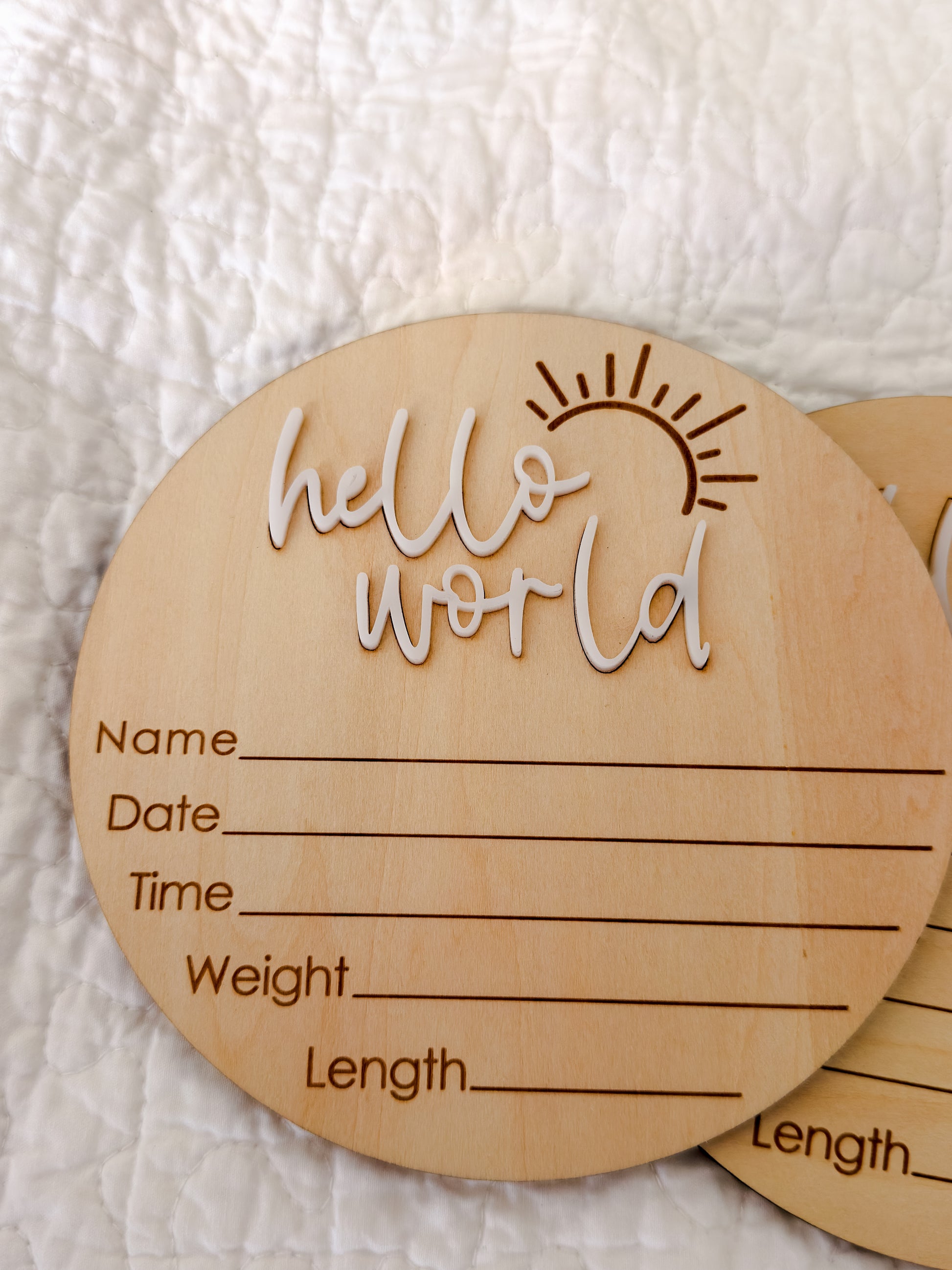 Hello World wooden milestone disc 15cm with engraved name, date, time, weight and length fields — Maxims Baby Store .newborn keepsake UAE
