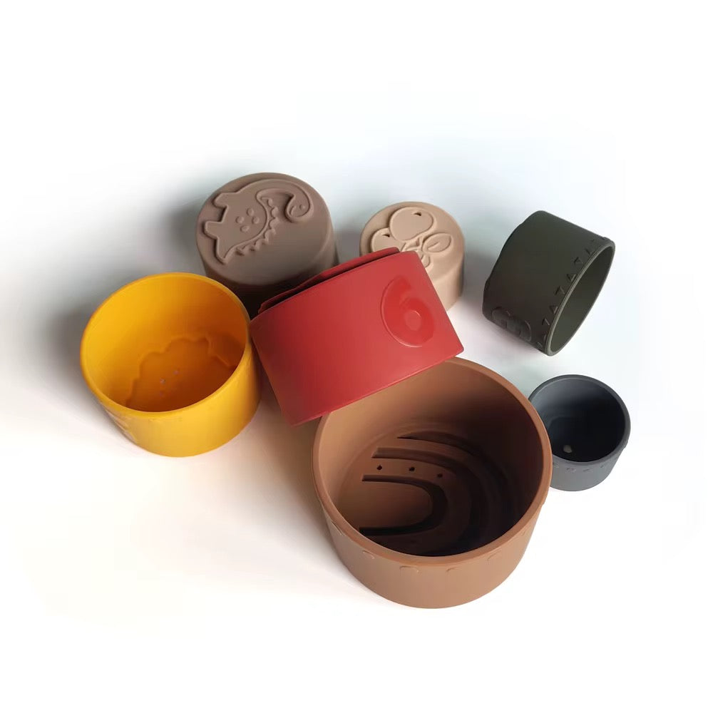 Neutral coloured Montessori silicone stacking cups for babies and toddlers