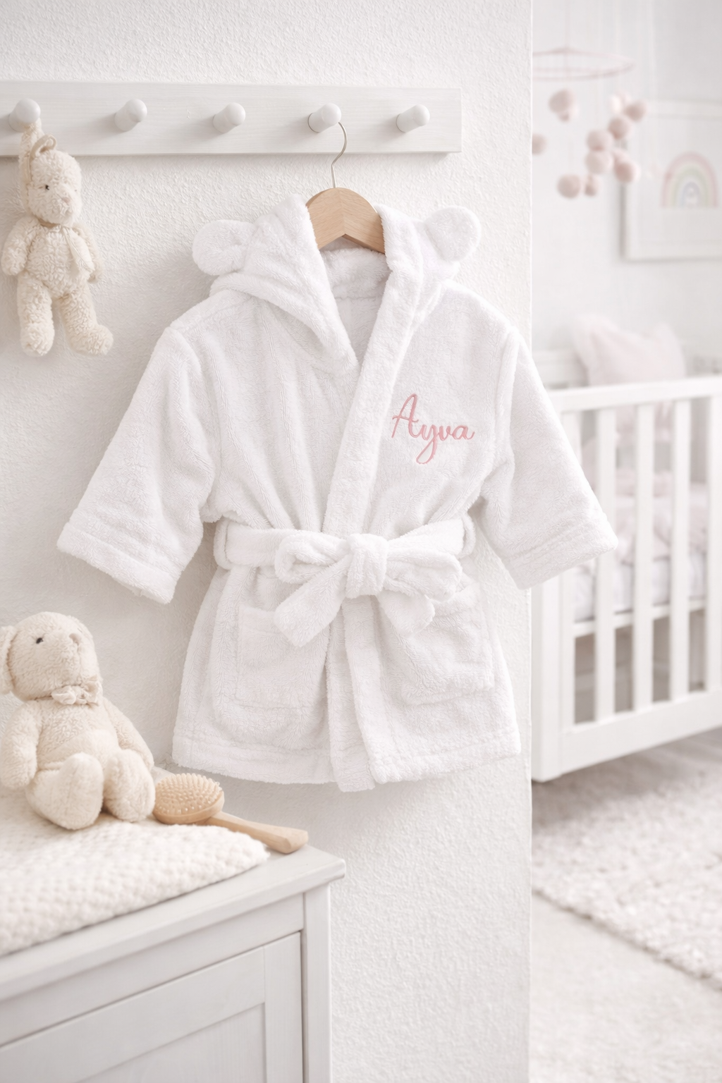 Close-up of embroidered name on organic cotton baby bathrobe — beautiful keepsake gift in Dubai UAE
