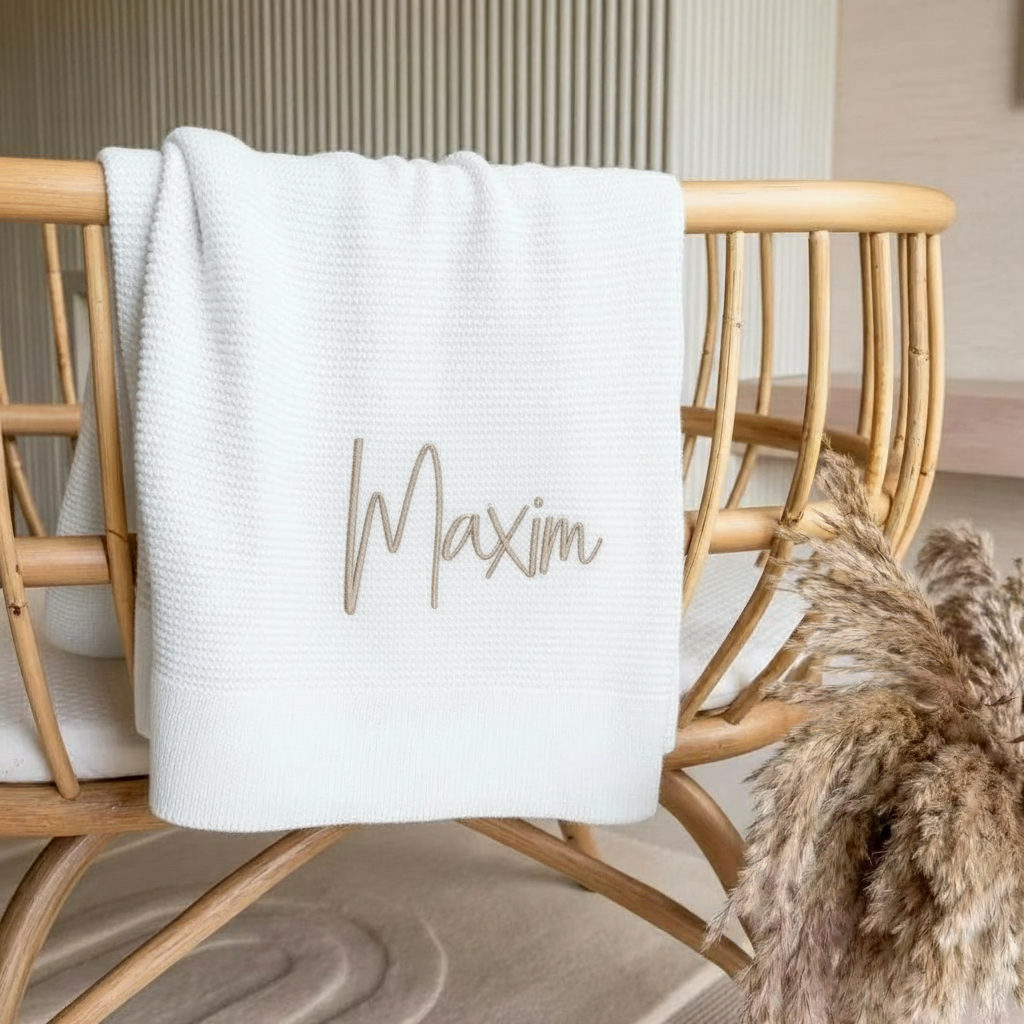 Personalised white bamboo cotton baby blankets with English and Arabic name embroidery — Maxims Baby store . signature blanket Dubai UAE
