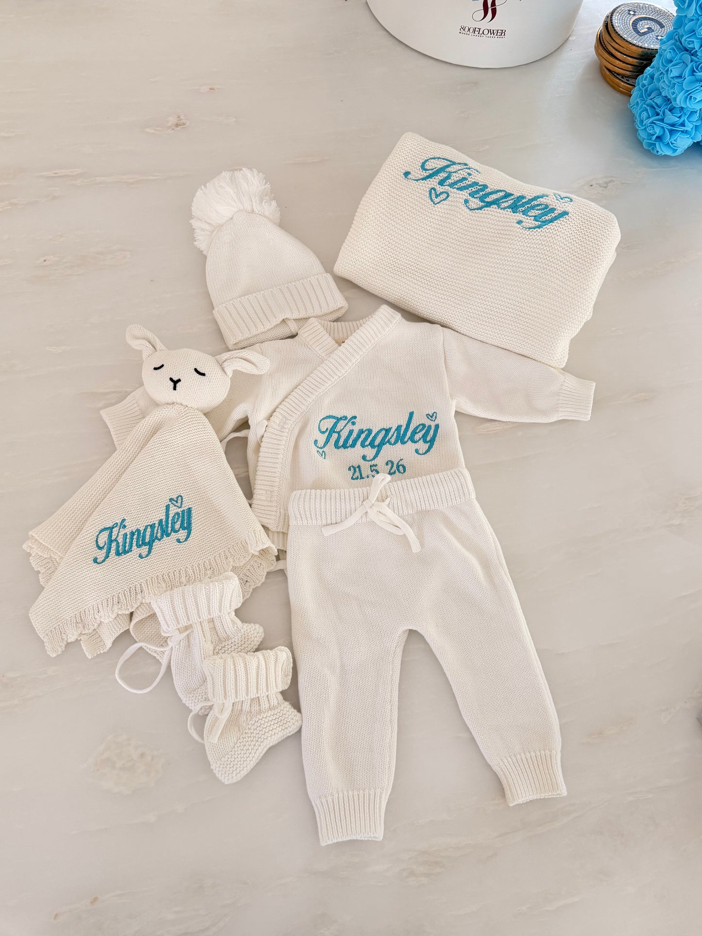 Personalised newborn knit cardigan and pants set embroidered with baby’s name and date of birth
