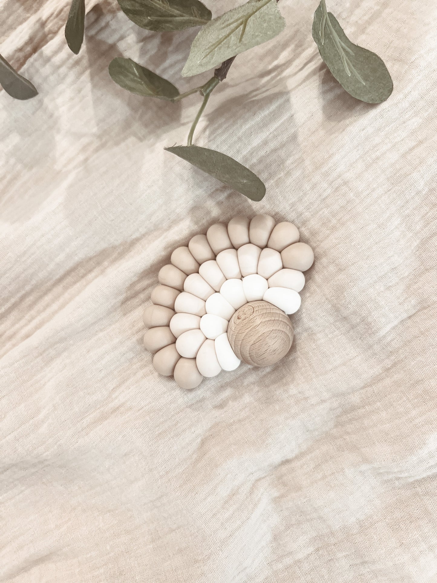 Personalised silicone and wooden baby teether with engraved name — soft, natural and gentle for newborn gums in Dubai UAE
