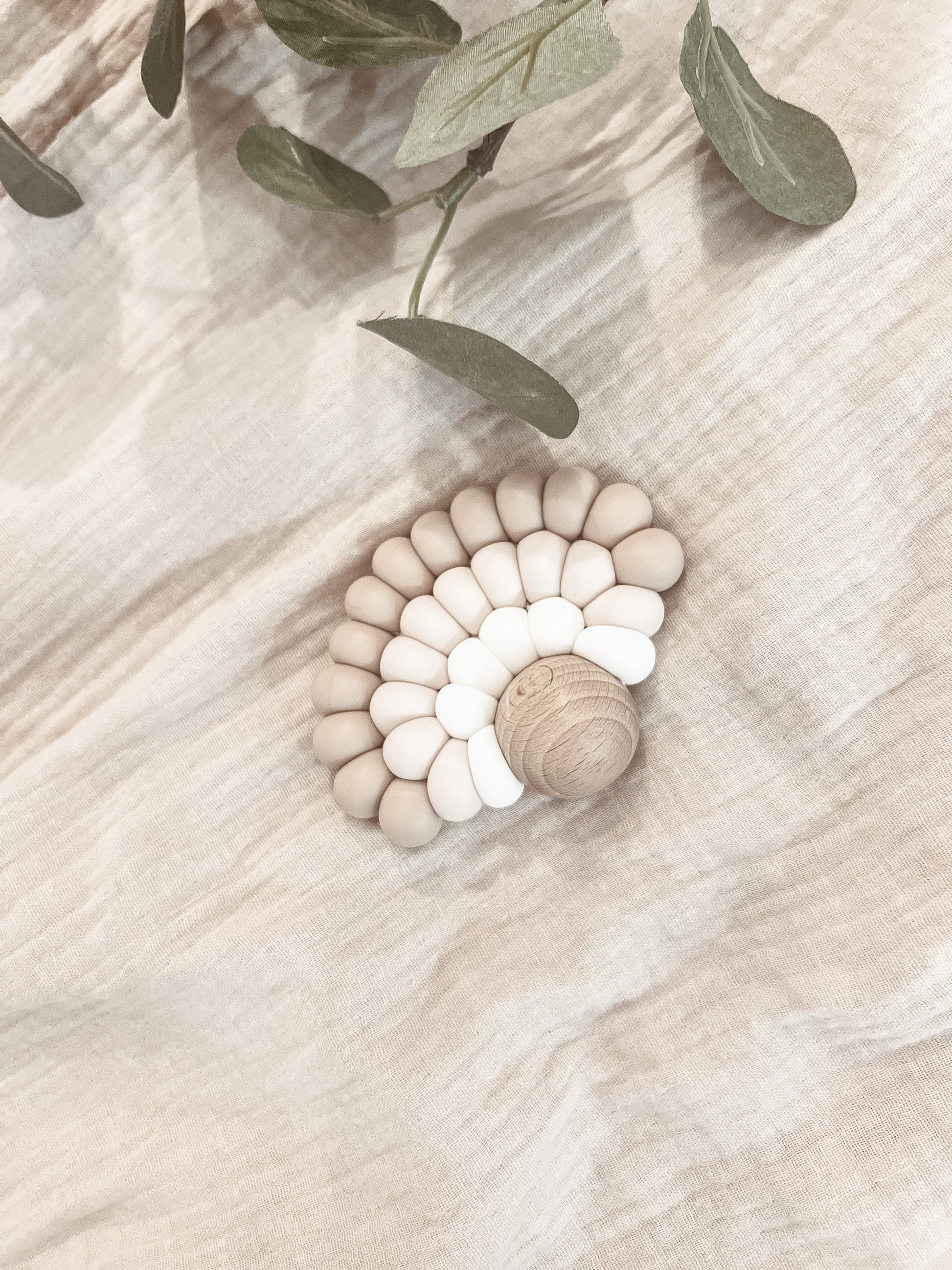 Personalised silicone and wooden baby teether with engraved name — soft, natural and gentle for newborn gums in Dubai UAE
