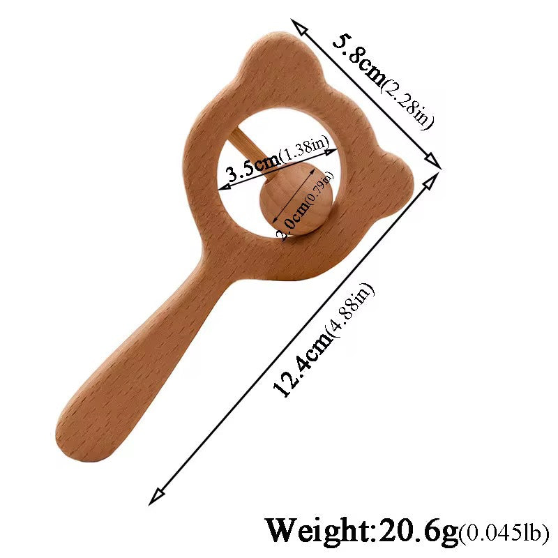 Personalised wooden baby rattle hand-engraved with baby's name — beechwood keepsake by Maxims  baby store . Dubai UAE

